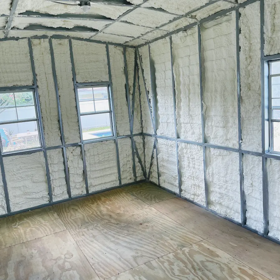 Closed-cell spray foam insulation applied to wall cavities in a residential project in Turlock